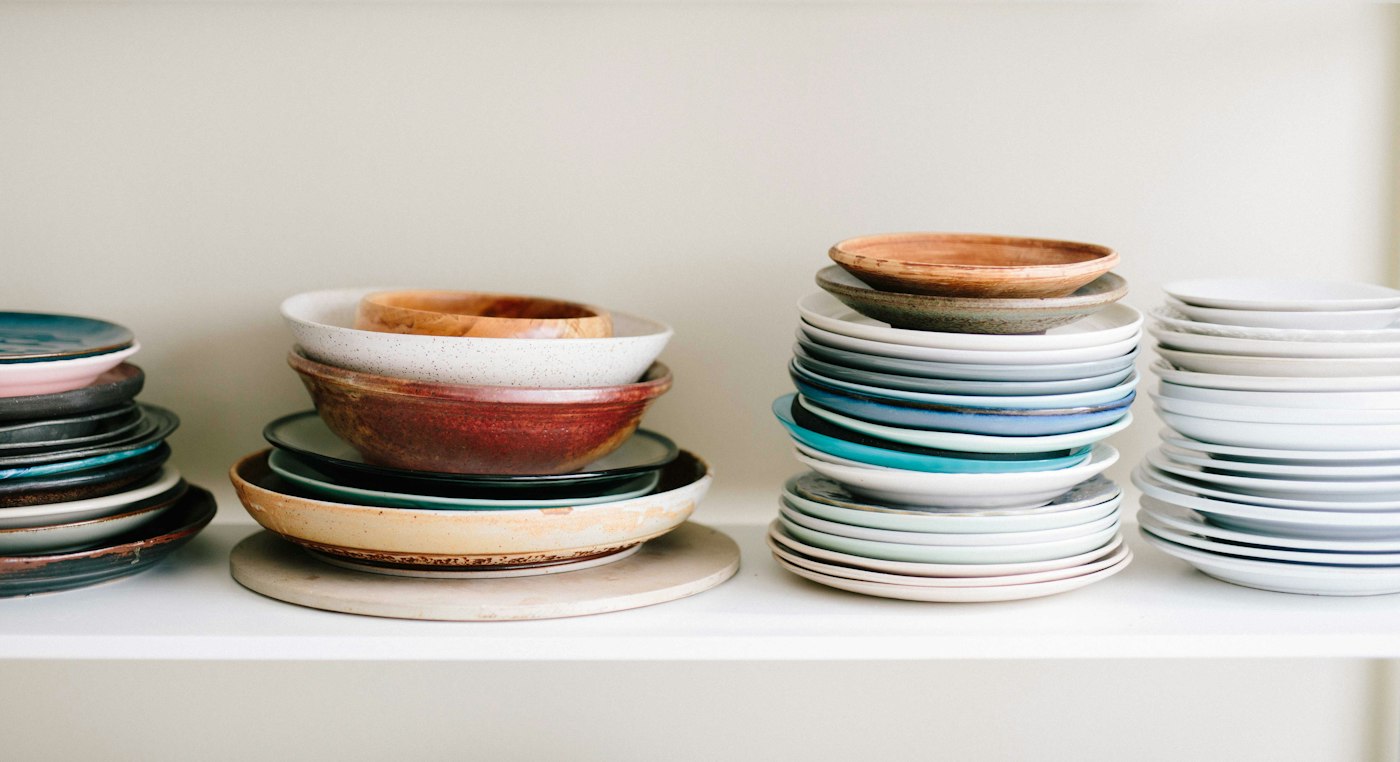 Stacks of finished ceramic plates and bowls